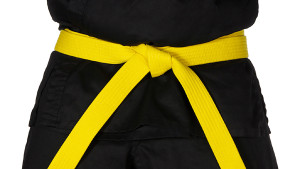 Karate Yellow Belt Tied Around Torso Black Uniform